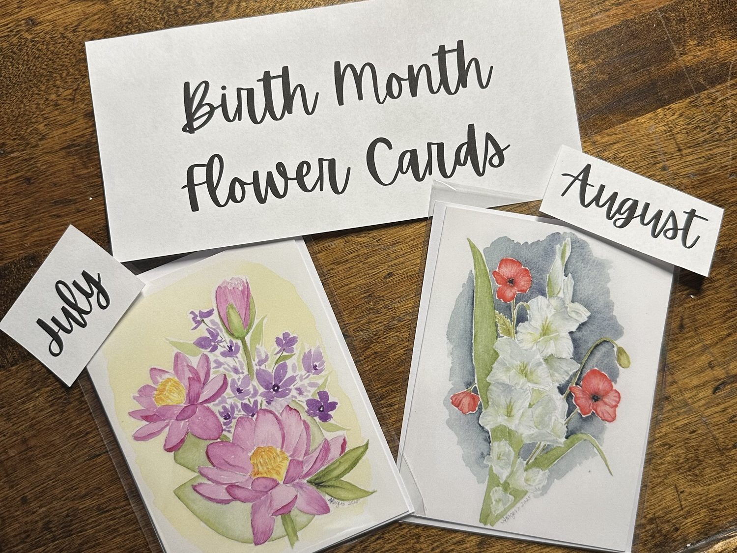 photo of note cards with flower paintings on the front.
